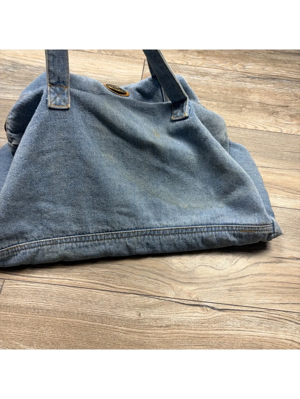 Vintage denim duffel bag, stains throughout but no distressing